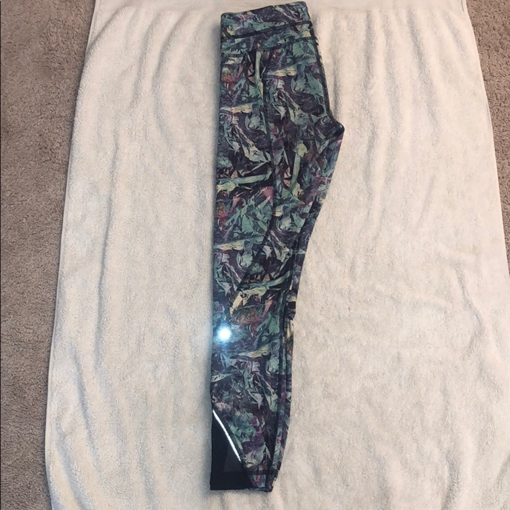 Lulu lemon leggings with mesh cutouts and pockets